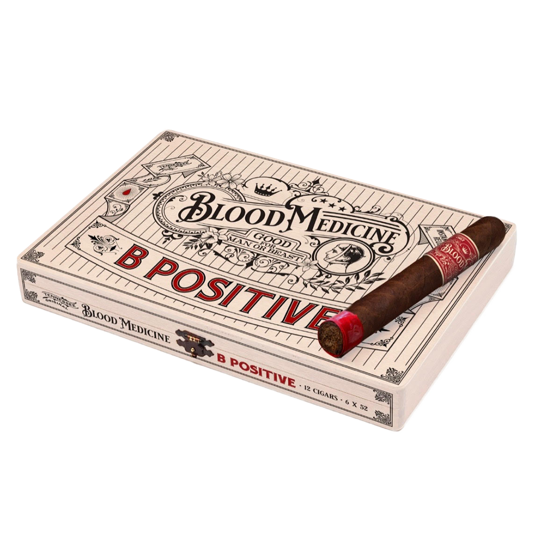 Cigar box labeled 'Blood Medicine B Positive' with a single cigar on a white background