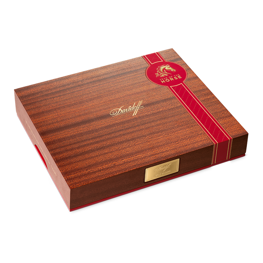 Wooden Davidoff cigar box with red ribbon and logo on a white background