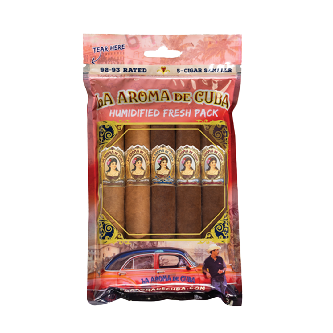 Pack of La Aroma de Cuba cigars with a vintage car and person on the packaging.