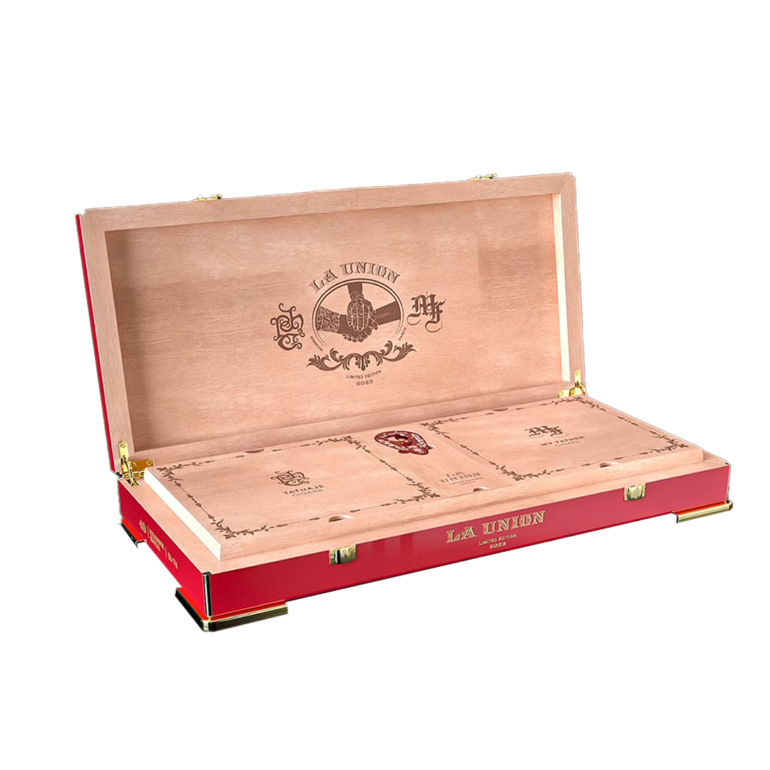 Open wooden and red leather cigar box with 'La Unión' branding on a white background
