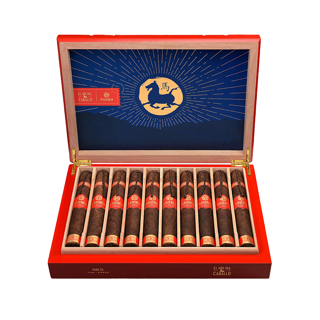 Open red cigar box with cigars inside, featuring a blue interior and decorative design.