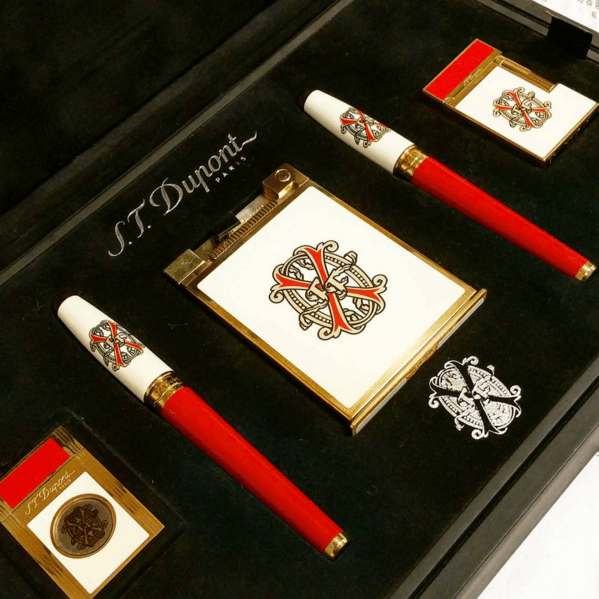 gift set with cutter, lighters, and pens