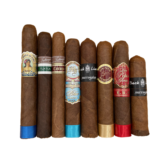 Assorted cigars with visible brand labels on a white background