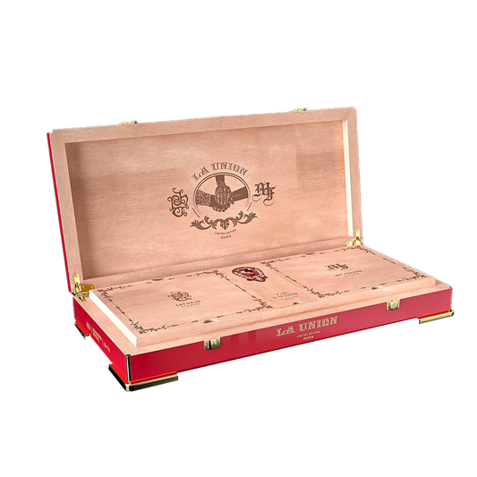 Open wooden and red leather cigar box with 'La Unión' branding on a white background